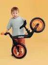 Детский беговел Junion Rokko, магниевый сплав, регулировка руля и сиденья, цвет чёрно-оранжевый